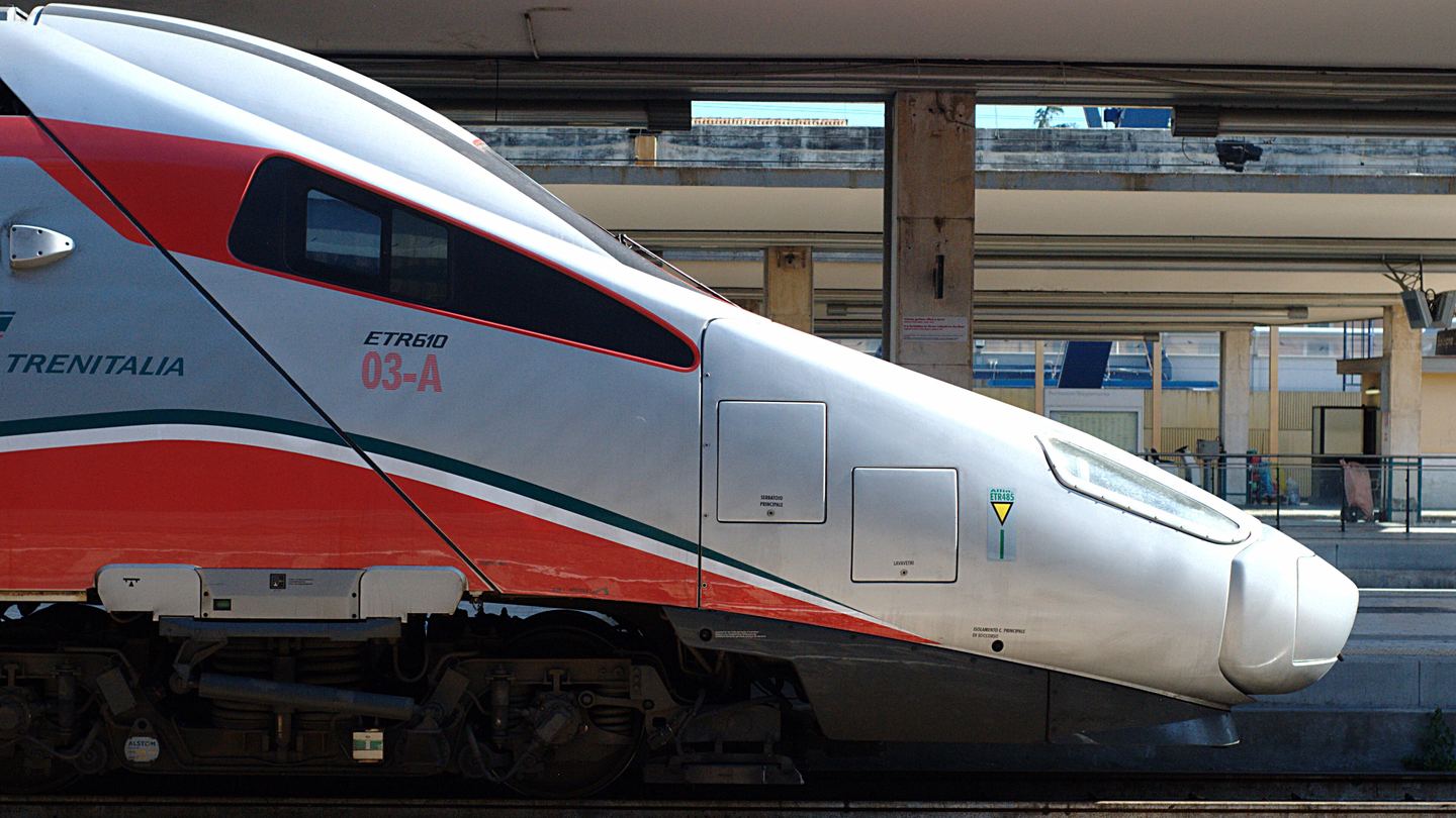 A Frecciarossa train at a platform in Italy