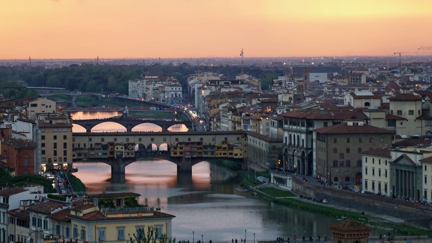 Ponte Vecchio and the Arno in Florence at sunset; context photograph, not Kacie Rose or her home